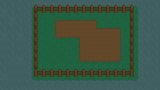 A field with an area that is not grass.
